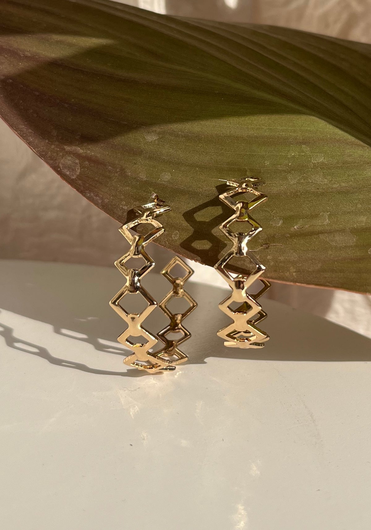 Gold Tone Geometric Link Hoop Earrings