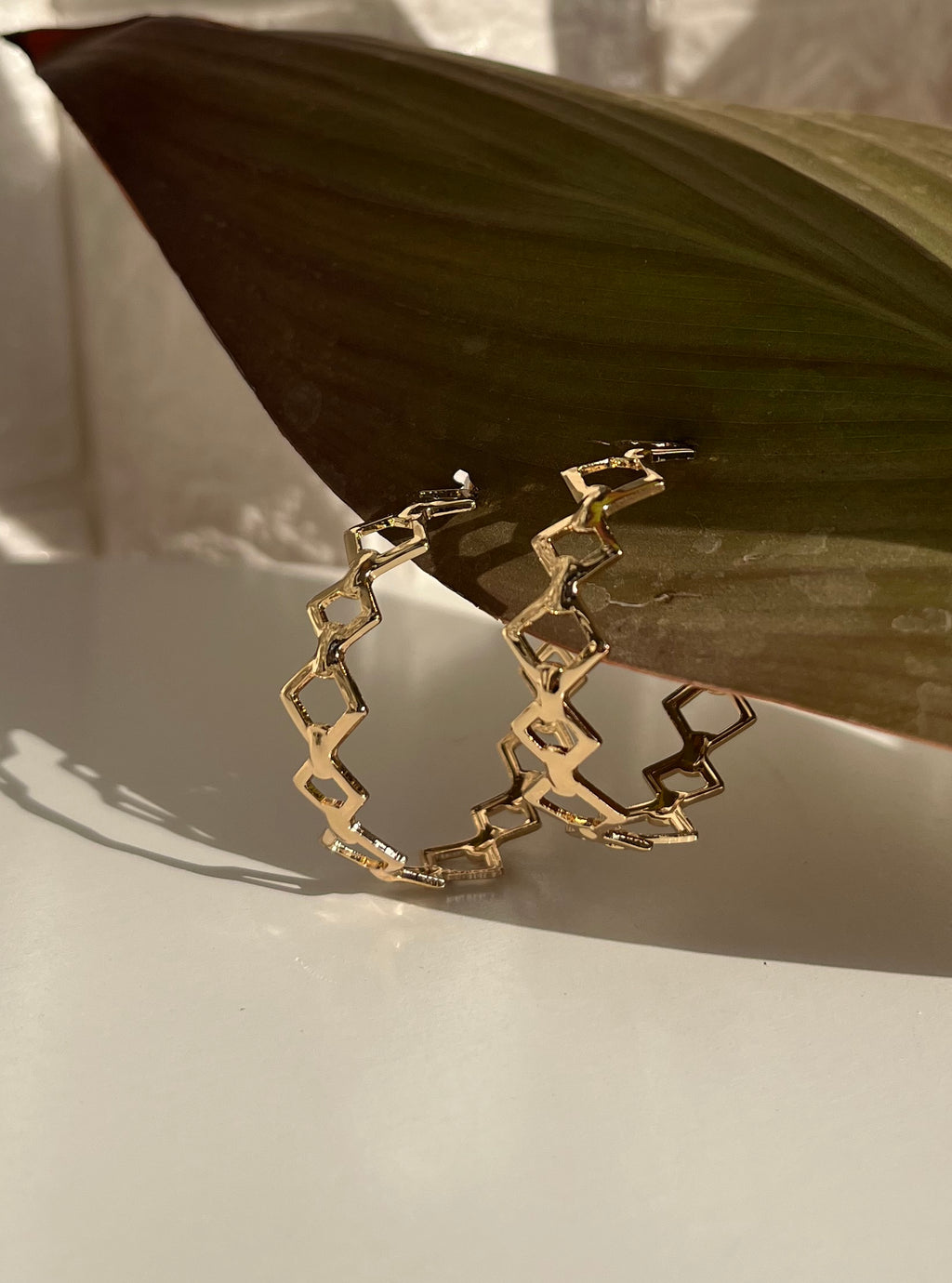 Gold Tone Geometric Link Hoop Earrings