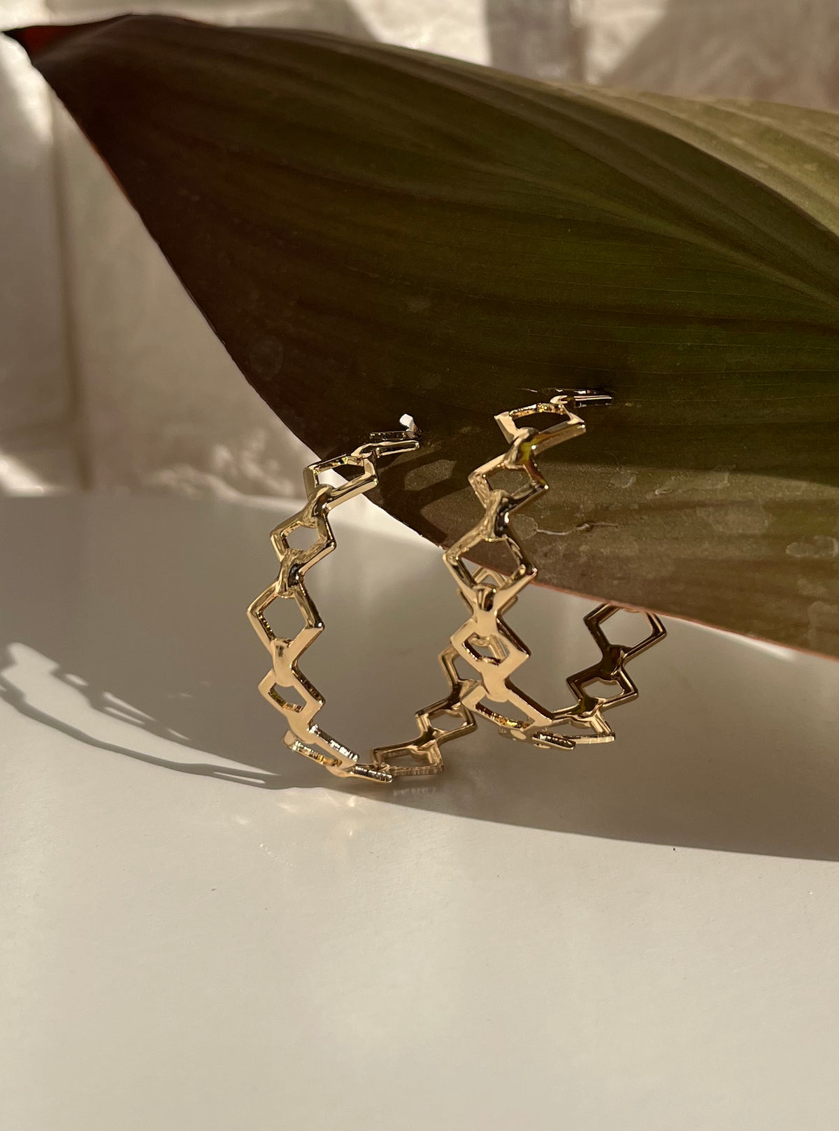 Gold Tone Geometric Link Hoop Earrings